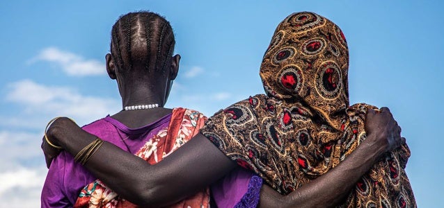 Women are seen at a displaced person's site that helps women in need, including victims of sexual violence, in Bentiu, Sudan.Photo: © OCHA/Alioune Ndiaye